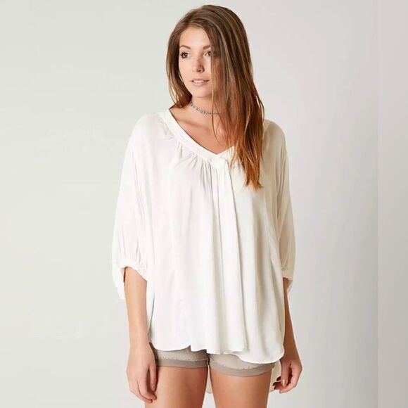 Free People Oversized V-Neck Top Rayon L25/27 “ bust 35” excellent condition - Picture 1 of 5